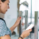 employee entering vuilding using access control system